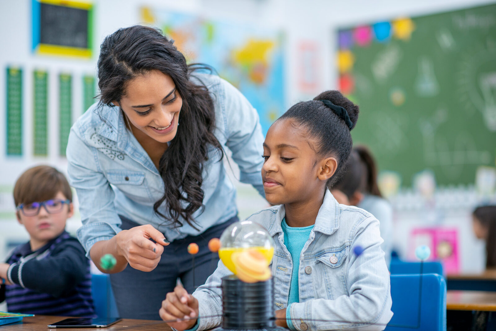 Teacher helping a student
